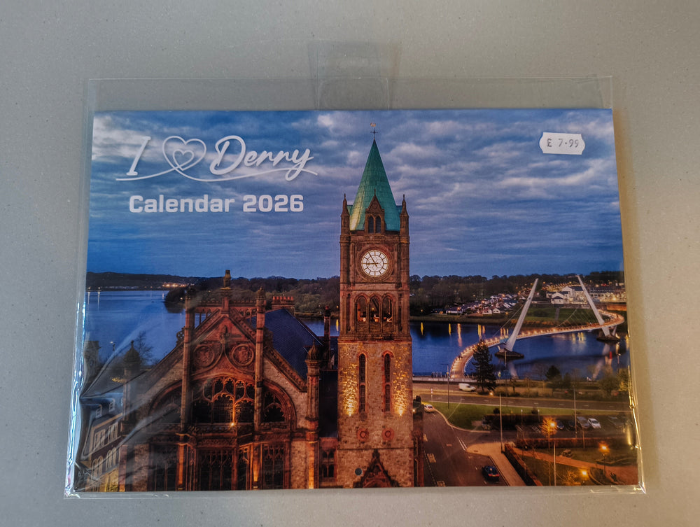 Calendar cover with a large clock tower design on a blue sky background
