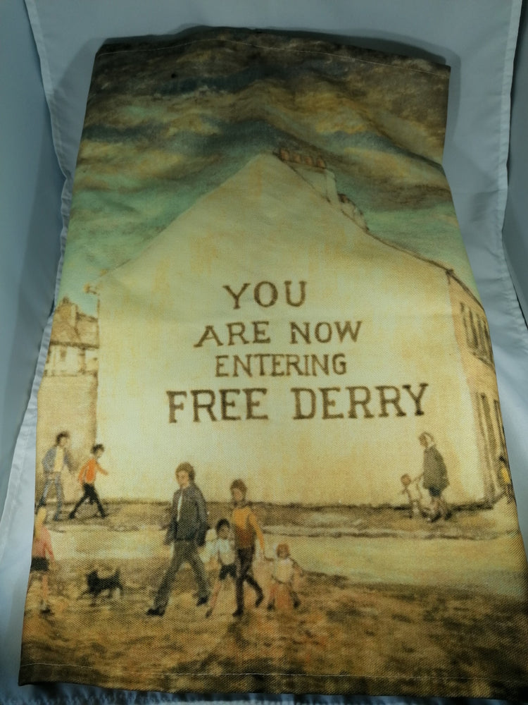
            
                Load image into Gallery viewer, Checkpoint Charlie &amp;#39;Free Derry&amp;#39; corner Tea Towel
            
        
