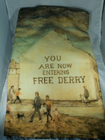 Checkpoint Charlie 'Free Derry' corner Tea Towel