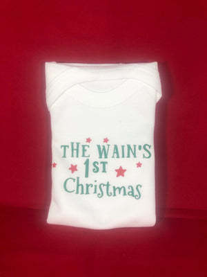
            
                Load image into Gallery viewer, Checkpoint Charlie &amp;#39;The Wain`s 1st Christmas&amp;#39; Baby Vest - white
            
        